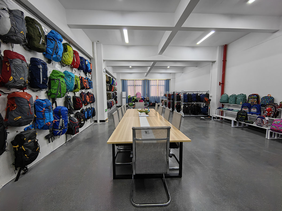 Stacked rolls of premium Cordura and X-Pac fabrics in the temperature-controlled warehouse
